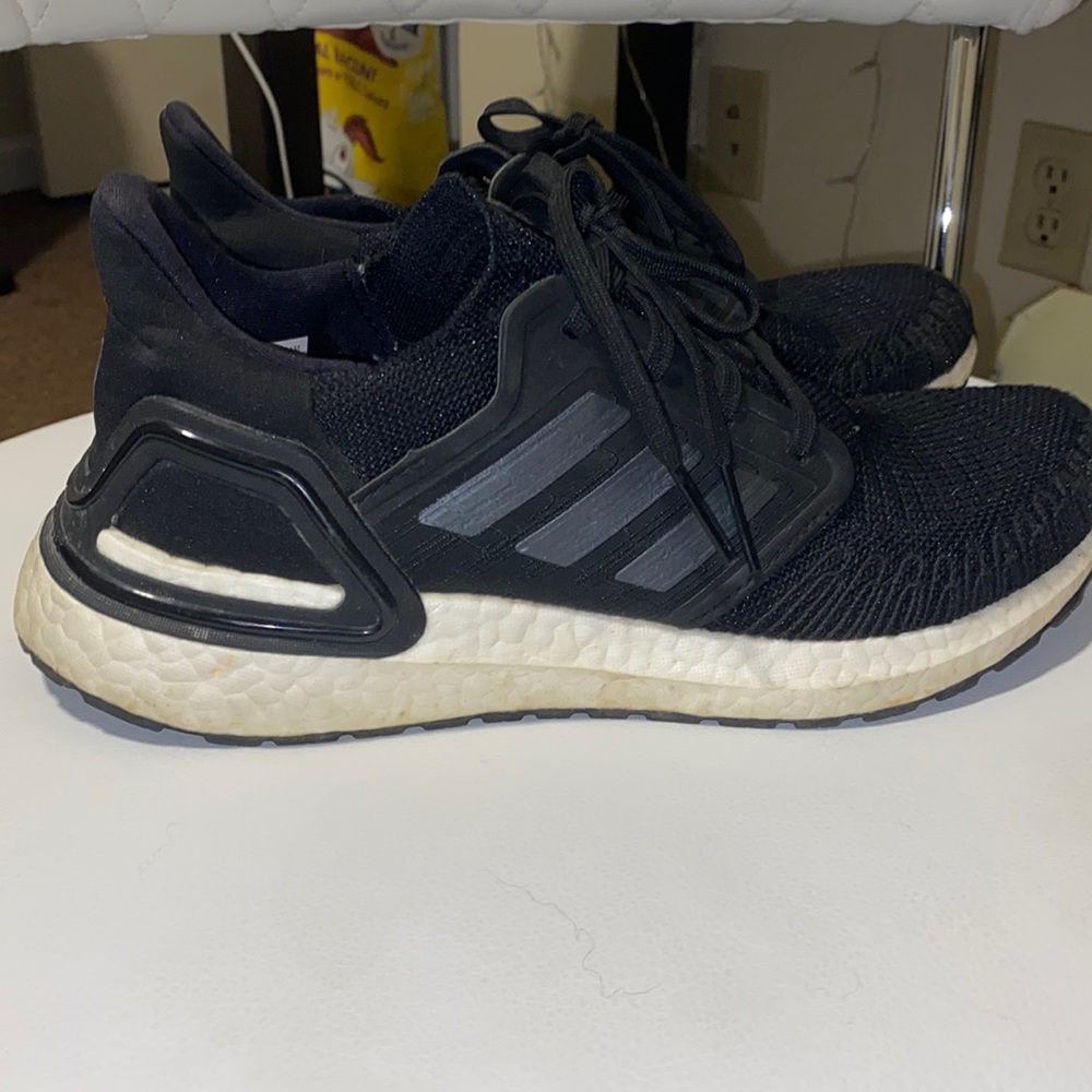 Black & white adidas ultra boosts